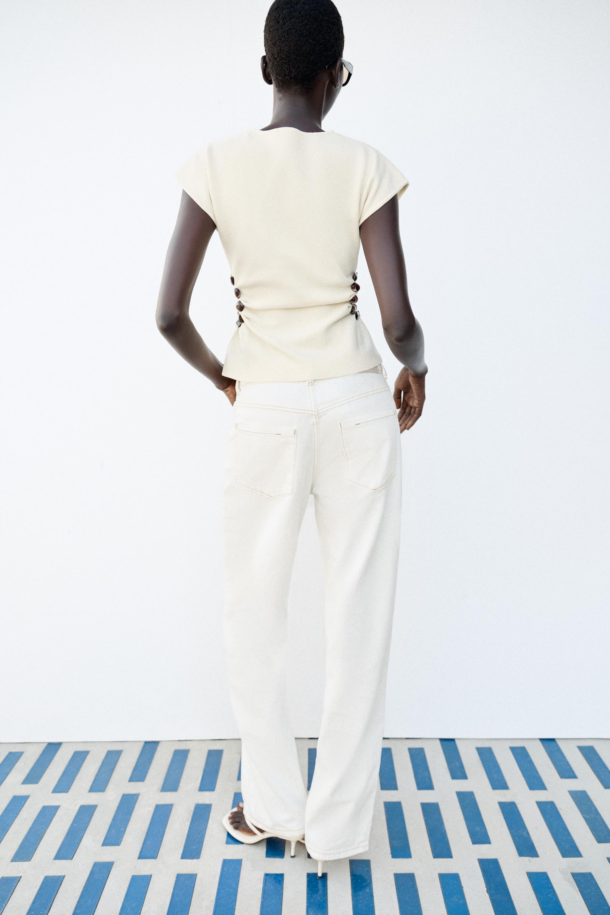 TOP EN MAILLE CUT OUT À PERLES
